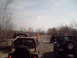 1991 Ford Bronco - A convoy of off-road vehicles navigates a dusty trail under a cloudy sky.