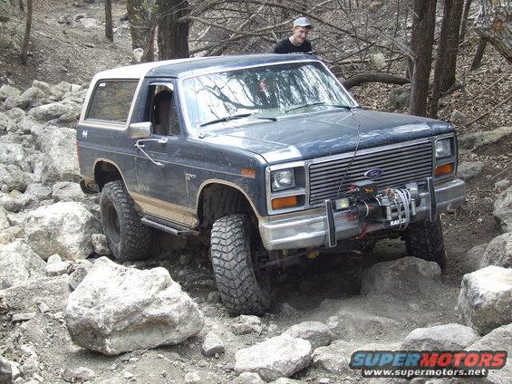 1986 Ford Bronco on rocky trail