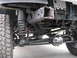 1994 Ford Bronco - Front suspension and drivetrain components are visible in this close-up shot.