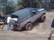 1991 Ford Bronco - 1991 Ford Bronco navigating an off-road course with a companion vehicle nearby.