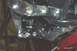 1994 Ford F-150 - The underside of a vehicle is shown, with various metal components and fasteners visible.