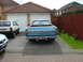 1970 Ford Ranchero - Rear view of a blue 1970 Ford Ranchero pickup truck parked in a driveway.