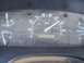 1994 Ford F-150 - A close-up of a vehicle's dashboard shows the odometer, speedometer, and other gauges.