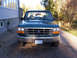 1996 Ford Bronco - This green Ford truck, likely a 1992 model, is shown from the front.