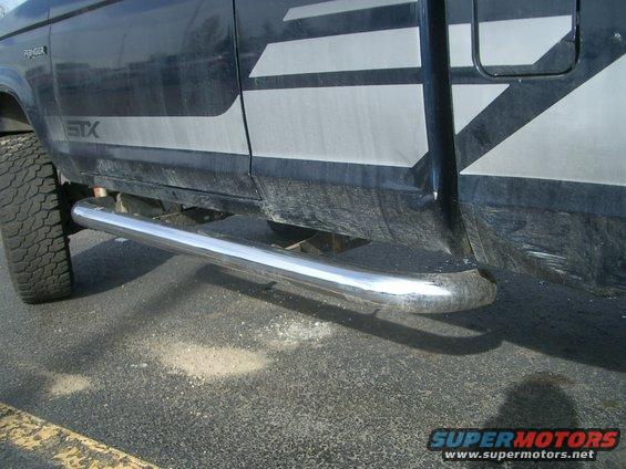 Side view of a 1992 Ford Ranger STX truck with chrome side steps