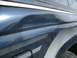 1992 Ford Ranger - A dented blue truck fender shows signs of repair with tape and has a graphic stripe.
