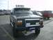 1992 Ford Ranger - A black Ford Explorer is parked in a lot, showing its front end with custom accessories.