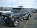 1992 Ford Ranger - This 1992 Ford Ranger STX pickup truck features a camper shell and auxiliary lighting.