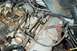 1991 Ford Crown Victoria LTD - Engine bay detail a carburetor and associated mechanical parts.