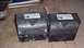 1997 Ford Crown Victoria - Pair of Whelen siren speakers, each with a caution label indicating proper mounting.