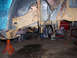 1996 Ford Bronco - Vehicle frame and suspension components showing significant rust, supported by jack stands.