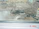 1995 Dodge 1500 - The windshield is heavily damaged with numerous cracks and scratches obscuring the view.