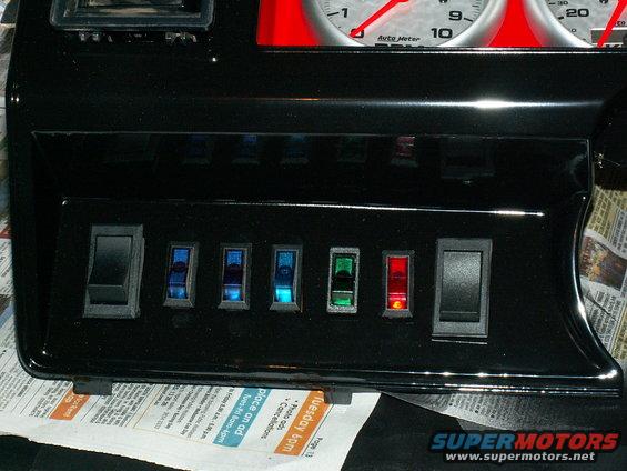 left switch panel..(L to R) headlights, spot-spread, spot-pencil, spots-roof, spare, winch on/off isolator, winch control in/out.