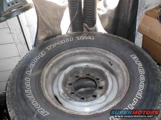 BFGoodrich Radial Long Trail T/A tire mounted on a steel wheel with 5 lug holes
