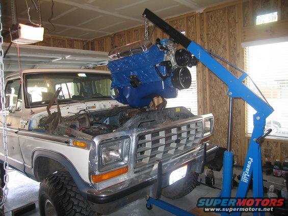 img_3751.jpg In it goes...  I had to take those L&L mounts off and bolt them to the frame perches and then bolt them to the engine. 