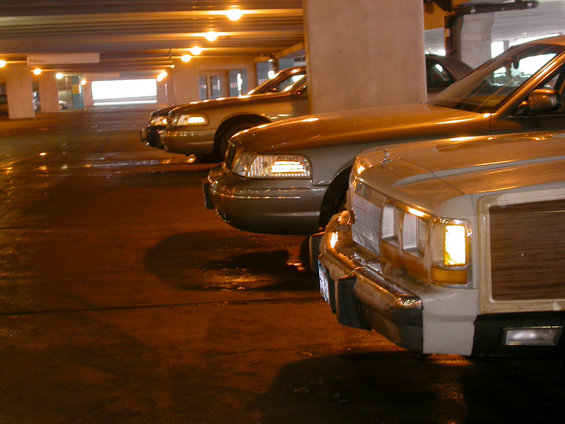 2001 Ford Crown Victoria, silver, parked in a garage, front 3/4 view
