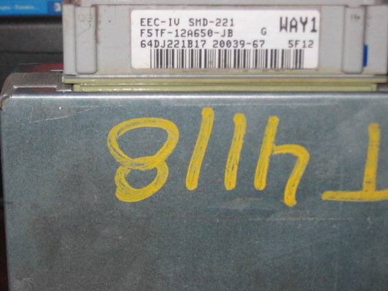 Ford EEC-IV electronic control unit with part number F5TF-12A650-JB and handwritten markings '8114 T'