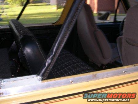 Interior view of a 1982 Ford Bronco showing front seats and door panel