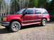 1991 Ford Explorer - This 1991 Ford Explorer is shown from the front three-quarter view, parked outdoors on a gravel surface.