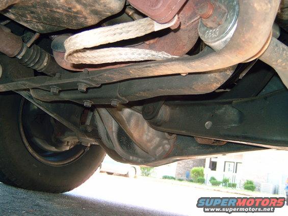 Undercarriage view of suspension and exhaust components
