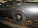 1978 Dodge Monaco - A gray 1978 Dodge Monaco sedan is shown from the side while on a vehicle lift.