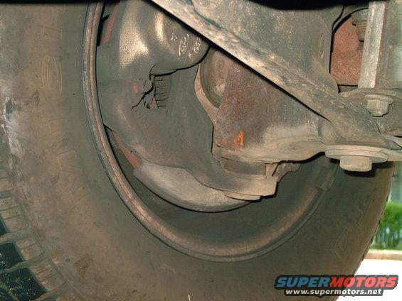 Close-up of a vehicle's wheel and suspension system