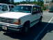 1993 Ford Explorer - The front quarter view of a white 1993 Ford Explorer parked in a lot.