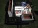 1996 Ford Bronco - Various vehicle parts are organized in boxes and placed on a trailer.