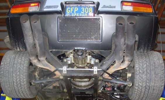 1972 DeTomaso Pantera rear view, showing quad exhaust pipes and wide tires