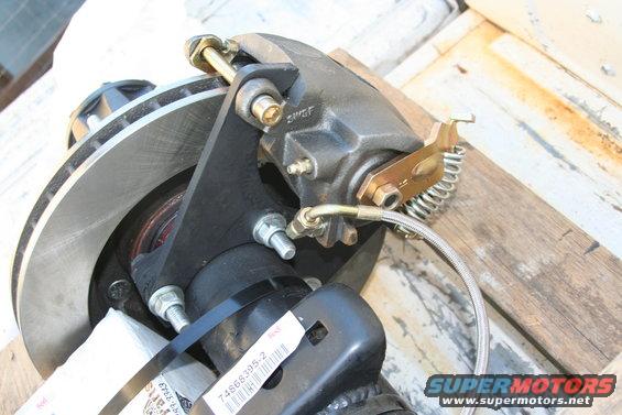Rear disc brake caliper and rotor assembly with part number 74S66395-2 visible