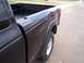 2003 Ford Ranger - Side view of a black Ford Ranger pickup truck bed with an 'EDGE' decal.