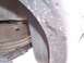 2003 Ford Ranger - This image shows the underside of a vehicle, focusing on the rear wheel well and suspension components.