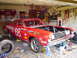 1968 Ford Torino - This 1968 Ford Torino race car is parked in a garage with the hood open and tools scattered around.