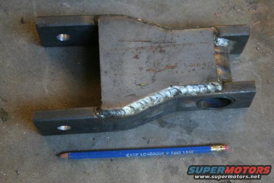 shackle.jpg Home fabbed shackles. Had a shop bend the steel, I did the rest. The shackle is 8.5" long, 6.25" eye to eye, and 0.5" thick. 1.5" OD x0.125" wall DOM was used for the bushing tube. The crossbrace is 1/4" steel.