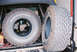 1981 Ford Bronco - Two BFGoodrich All-Terrain T/A tires are visible inside the rear of a vehicle.