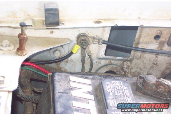dcp_0899.jpg Ground Connection
The ground connection is made to the factory ground post next to the battery at right front of engine compartment.
(4/29/2006)
