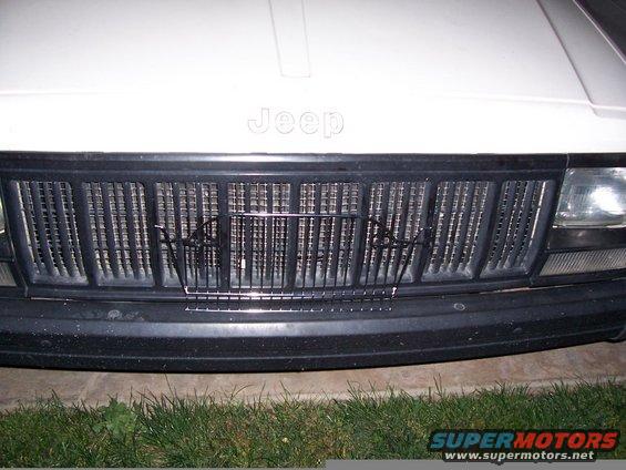 Jeep Cherokee XJ grille with a wire bug screen installed