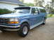 1995 Ford Bronco - This blue 1995 Ford Bronco is equipped with a camper shell and seen from a 3q-front angle.