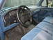 1995 Ford Bronco - Interior view of a 1995 Ford Bronco, blue cloth seats and dashboard.