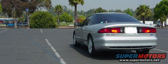 Silver 1993 Ford Probe parked in a lot, rear view