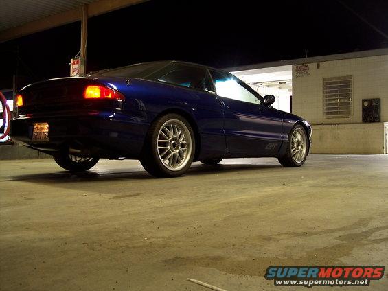 Blue 1995 Ford Probe GT rear 3/4 view with aftermarket rims