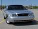 2002 Ford Crown Victoria - A silver 2002 Ford Crown Victoria is shown from the front in a parking lot.