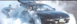 1996 Ford Probe - A 1996 Ford Probe is engulfed in smoke as a person exits the driver's side door.