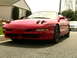 1993 Ford Probe - This 1993 Ford Probe is captured in a front 3/4 view, parked on a residential street.