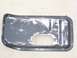 1978 Ford Bronco - A metal part with an oval cutout and mounting holes, exhibiting signs of wear and rust.