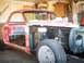 1968 Ford Ranchero - This vehicle is in a state of disrepair, with its doors removed and the front end partially disassembled.
