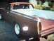 1968 Ford Ranchero - This 1968 Ford Ranchero pickup truck features a brown body with a red roof and bed.