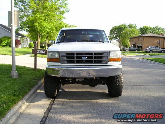 White 1990 Ford Bronco front view with grille detail