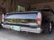 1968 Ford Ranchero - Rear view of a black 1968 Ford Ranchero parked in a garage.