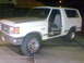 1988 Ford Bronco - The front grille and headlight design suggest this SUV is from the late 1980s, likely a 1987 model.